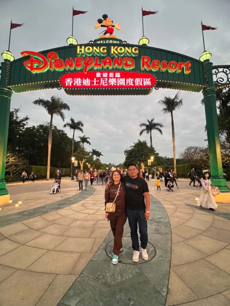 Couple at the Hong Kong Disneyland Resort entrance