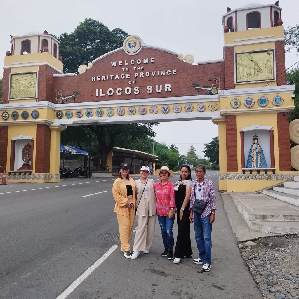 Travelers at the Ilocos Sur heritage arch