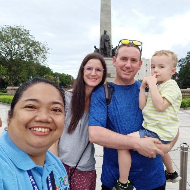 Astrokidd guide with a visiting family at Rizal Park, Manila