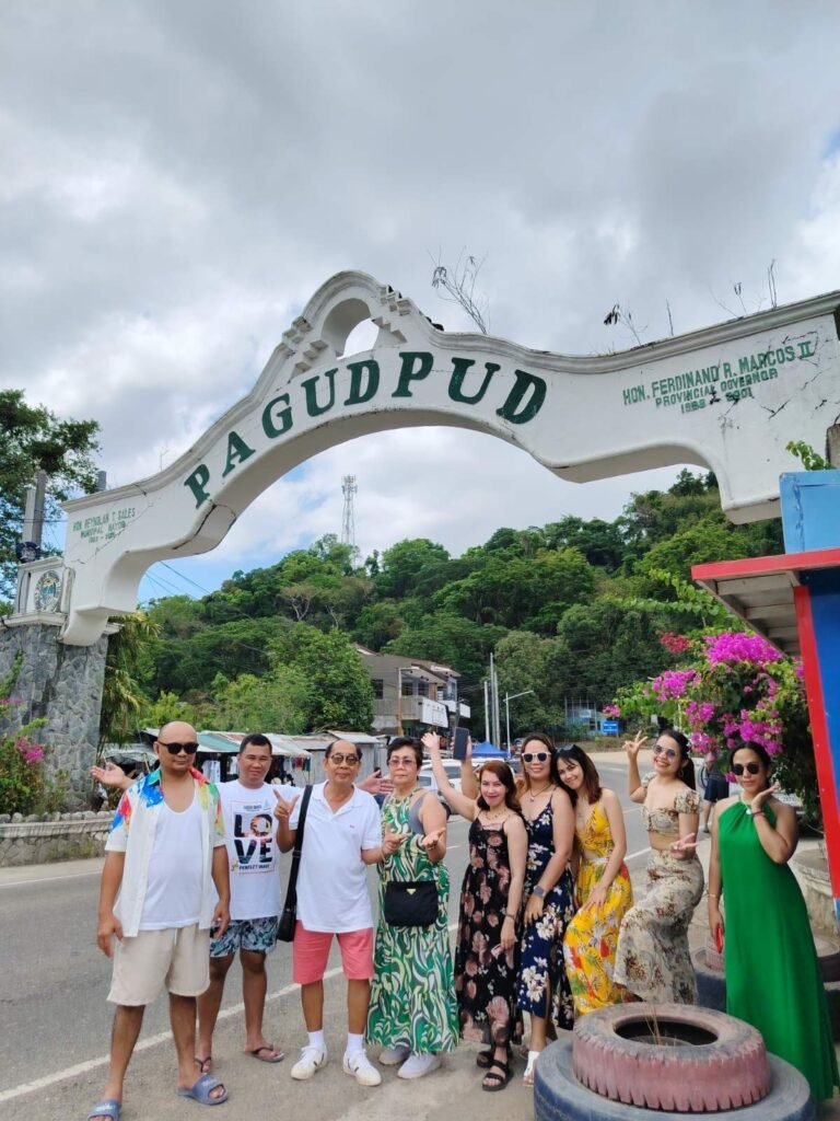 Astrokidd group at the Pagudpud welcome arch, Ilocos Norte
